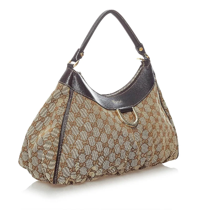 Women Gucci Sylvie bags featuring the signature web stripeGucci GG Canvas Abbey D-Ring Shoulder Bag (31464)