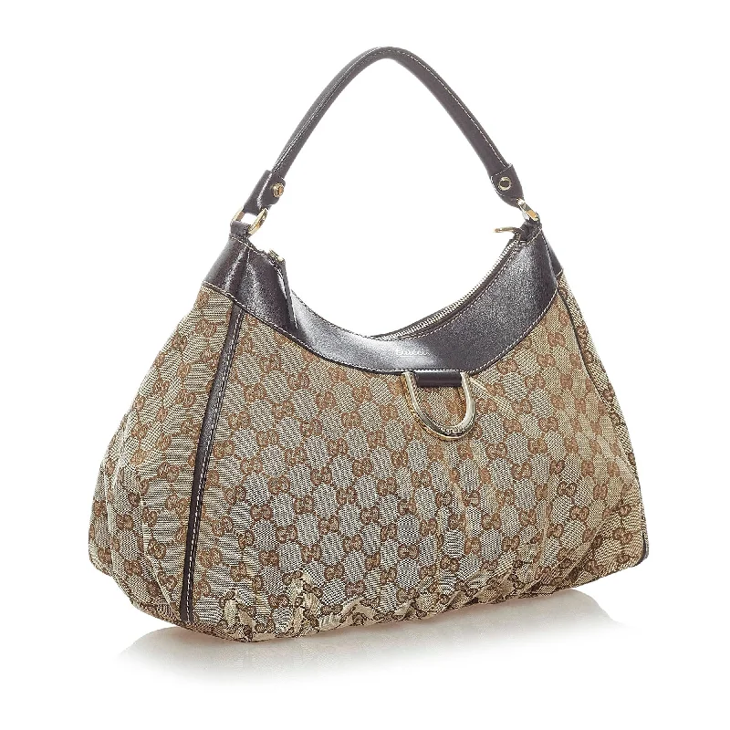 Women Gucci Sylvie bags with a monogram - embossed leatherGucci GG Canvas Abbey D-Ring Shoulder Bag (34771)