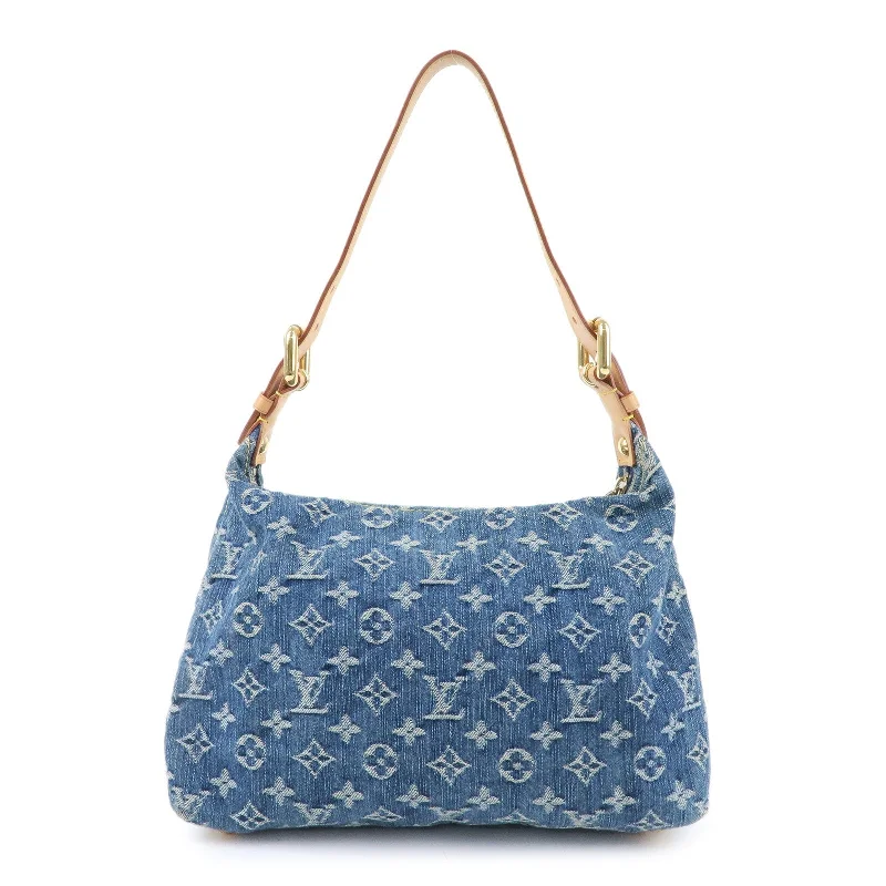 Louis Vuitton Twist bags with a contrast - colored interior for visual interestLouis Vuitton Monogram Denim Baggy PM Shoulder Bag M95049