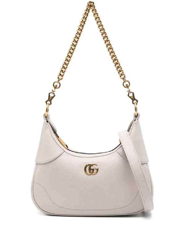 Women Gucci Sylvie bags with a monogram - embossed leatherGucci Women Aphrodite Small Leather Shoulder Bag