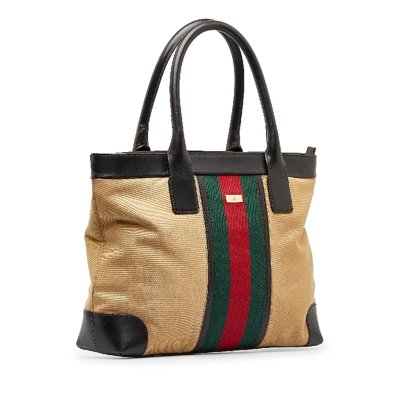 Women Gucci Sylvie bags with a monogram - embossed leatherGucci Web Tote Bag (SHG-PfOqI7)