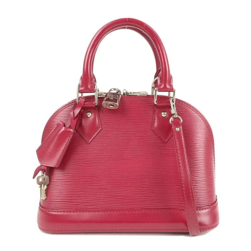 Louis Vuitton bags with a snap - button closure and a decorative charm for styleLouis Vuitton Epi Alma BB Hand Bag Shoulder Bag Fuchsia M40851