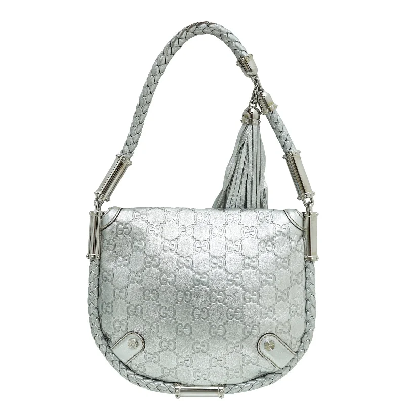 Ladies Gucci shoulder bags with a tassel decorationGucci Metallic Silver Guccissima Britt Tassel Small Bag