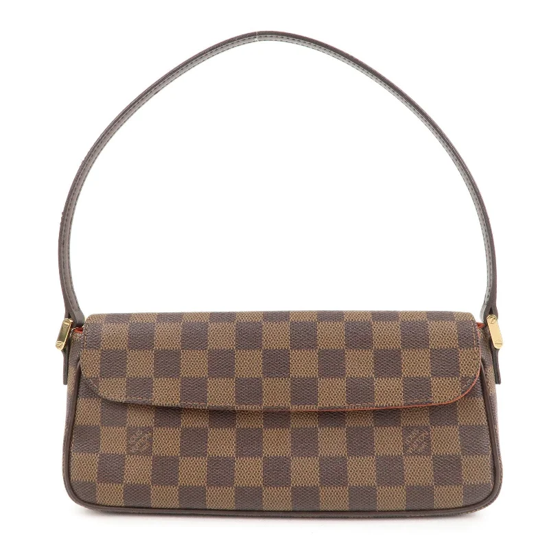 Louis Vuitton crossbody bags in a bold red color for a statementLouis Vuitton Damier Recolator Shoulder Bag M51299