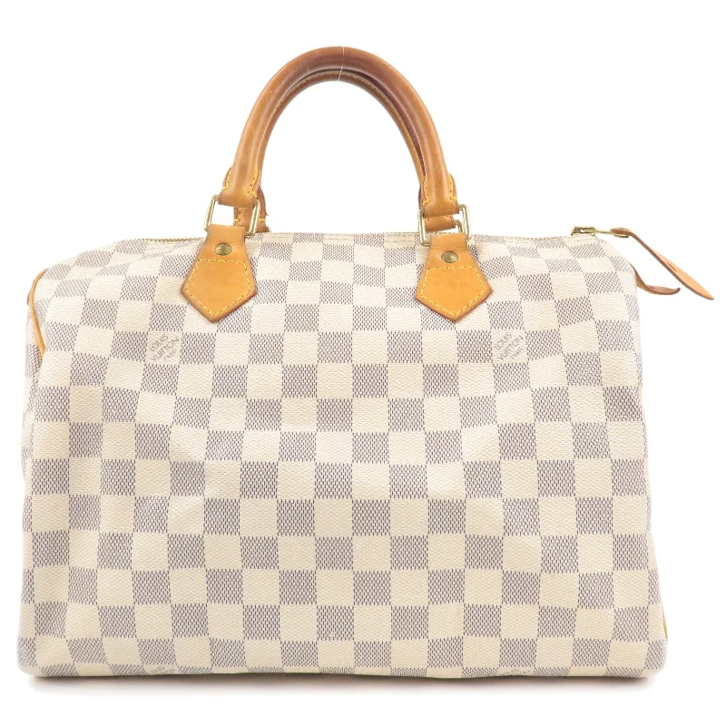 Louis Vuitton Speedy bags in monogram canvas for a classic lookLouis Vuitton Damier Azur Speedy 30 Boston Hand Bag N41533