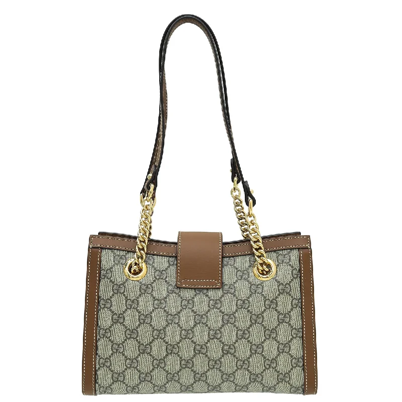 Gucci Marmont bags for women with a contrast - colored interiorGucci Bicolor GG Supreme Padlock Small Tote Bag