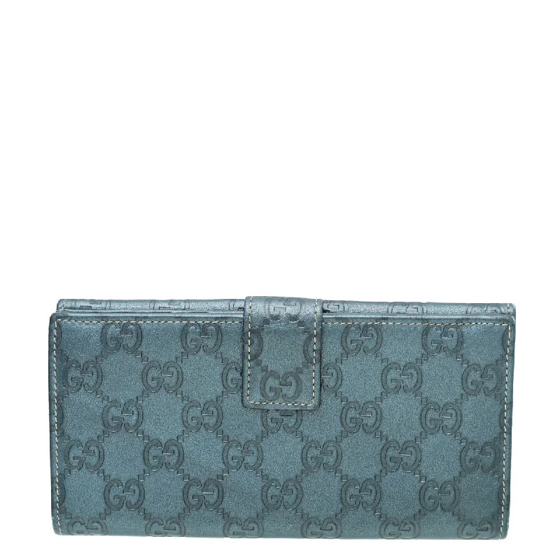 Gucci tote bags for women with a spacious interiorGucci Metallic Slate Blue Guccissima Metal Bar Continental Wallet