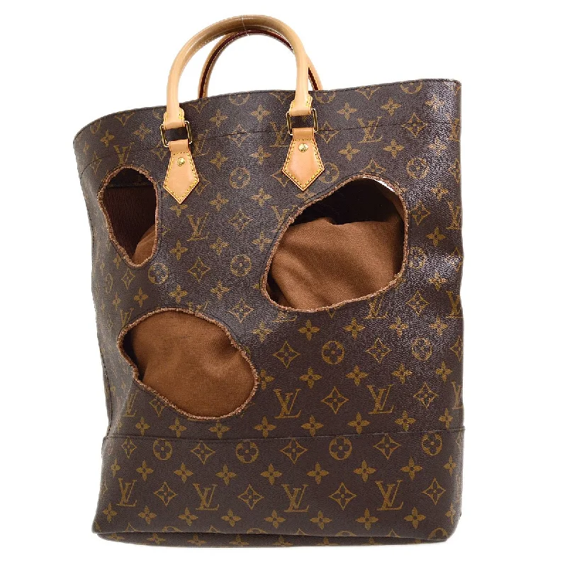 Louis Vuitton tote bags with a water - resistant coating for outdoor useLOUIS VUITTON x Comme Des Garçons Bag with Holes