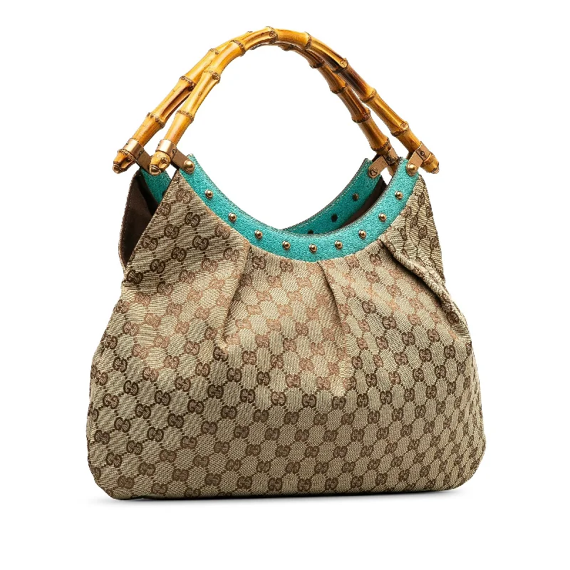 Ladies Gucci Dionysus bags with a chain - link shoulder strapGucci GG Canvas Bamboo Studded Handbag (7VMhOz)