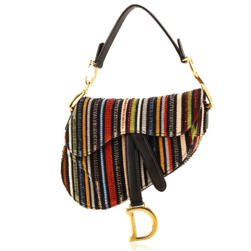 Christian Dior Saddle bags with a patent leather finish for a shiny lookSaddle Handbag Embroidered Striped Canvas Mini