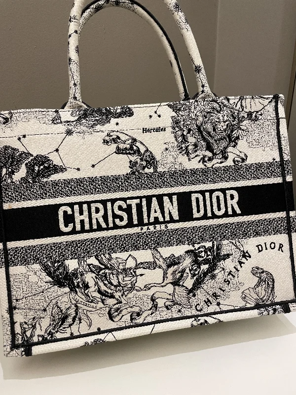 Contemporary Christian Dior handbags with a unique shapeDior Toile De Jouy Zodiac Book Tote Black/ White Embroidery